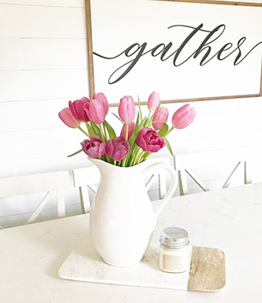 Pink tulips in white vase