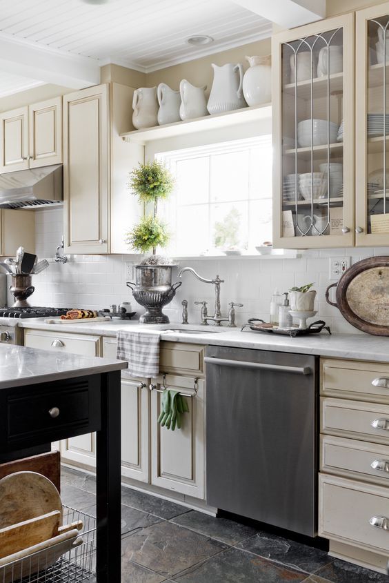 Creamware above Kitchen Cabinets