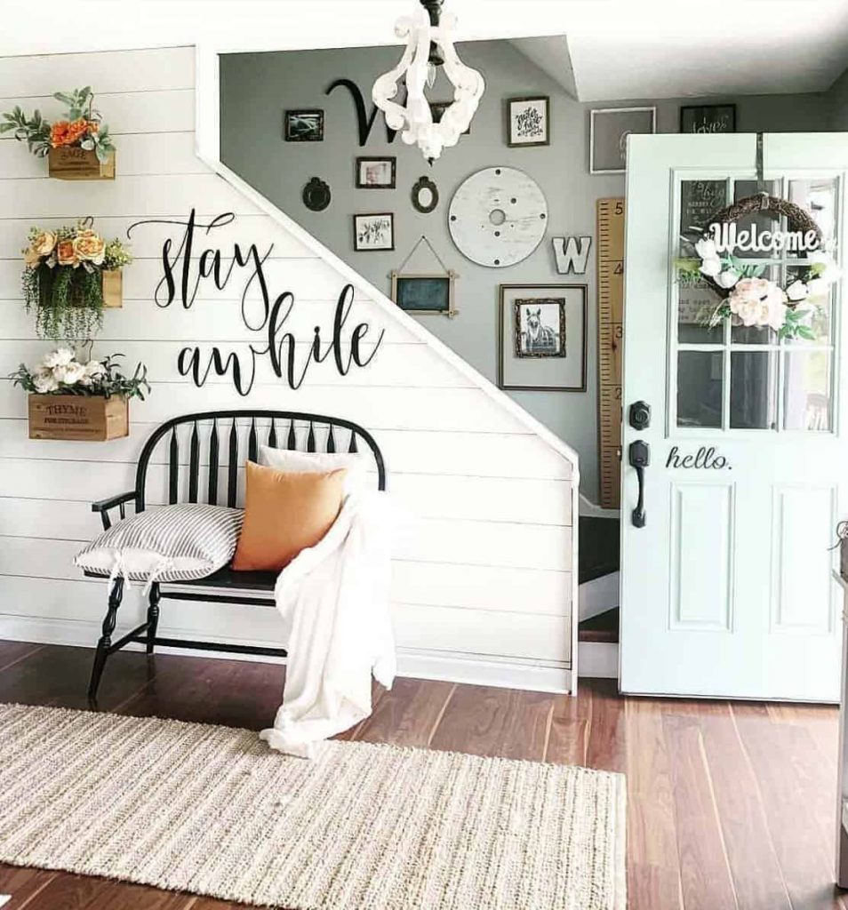 Entryway with bench and herb boxes