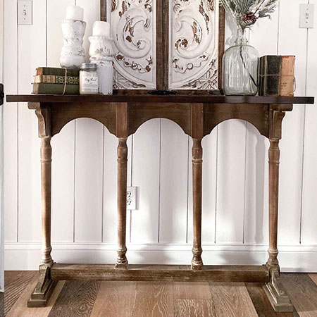 arched spindle console table